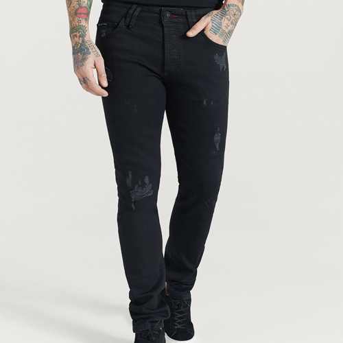 Svarta slitna jeans herr